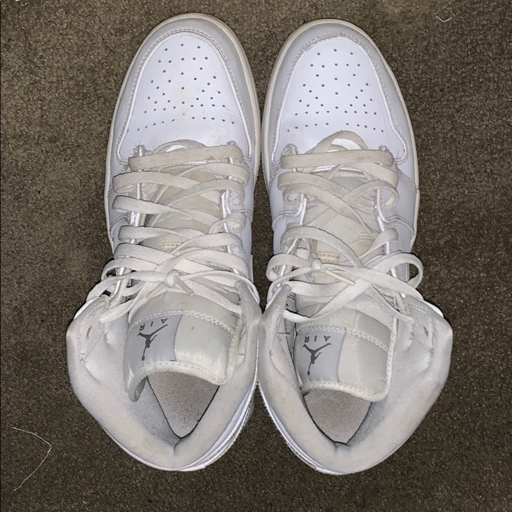All white retro jordan 1’s